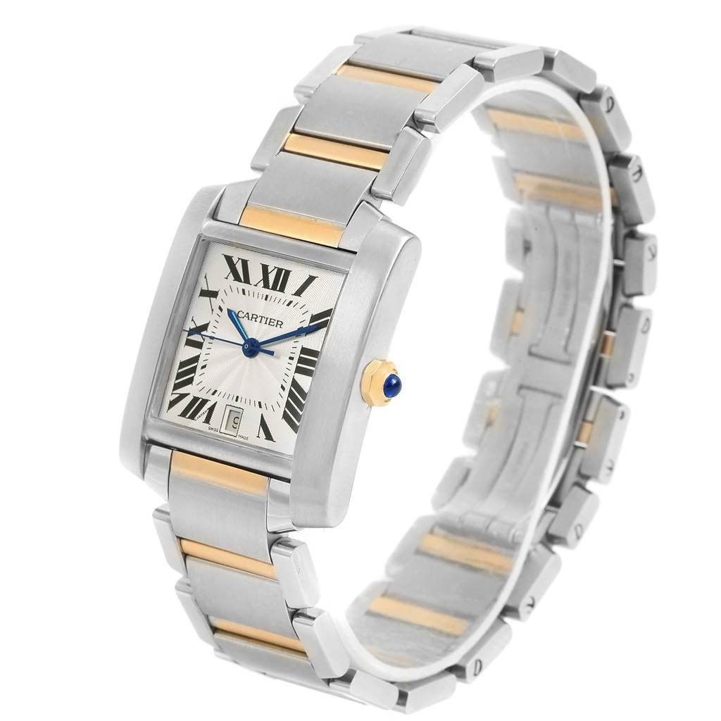 The Cartier Tank Francaise W51005Q4 Men's Steel and Gold (two tone) Silver Dial W51005Q4 Men's Steel and Gold (two tone) Silver Dial watch is shown at an angled view, highlighting its two-tone silver and gold bracelet and rectangular face.