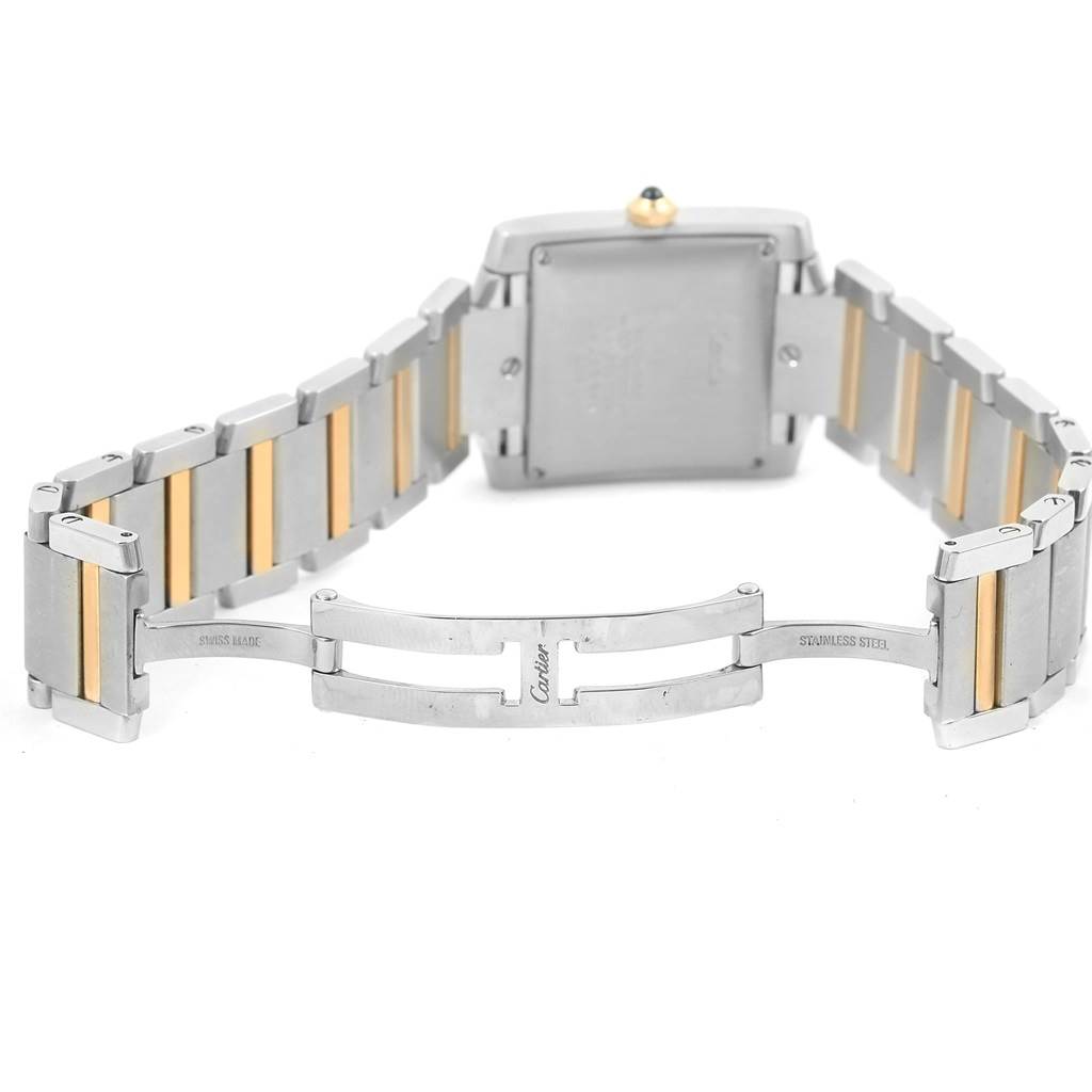 This image shows the clasp and the back of the bracelet of a Cartier Tank Française watch.