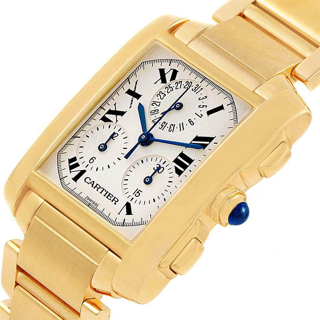 The Cartier Tank Française watch is shown at an angle, displaying the gold case, Roman numeral dial, and blue hands.