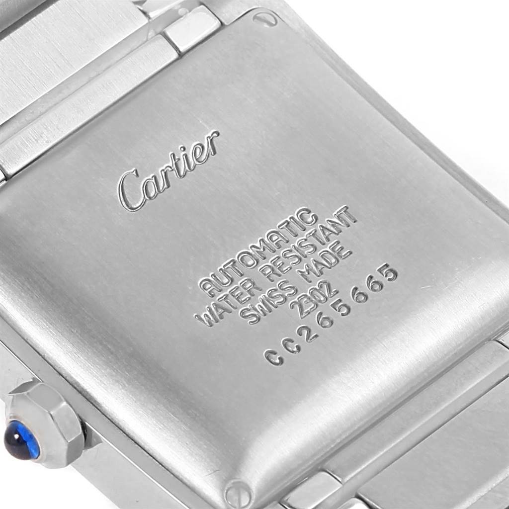 The image shows the back of the Cartier Tank Francaise W51002Q3 Stainless Steel Silver Dial W51002Q3 Stainless Steel Silver Dial watch, highlighting the case back and part of the bracelet with the crown in view.