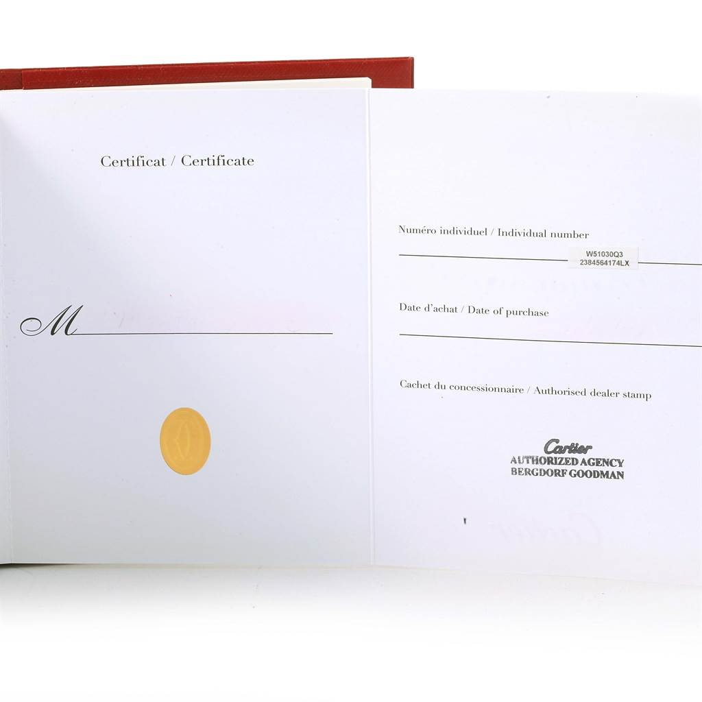 The image shows the certificate of authenticity and purchase details for a Cartier Tank Française model watch, along with the authorized dealer's stamp.