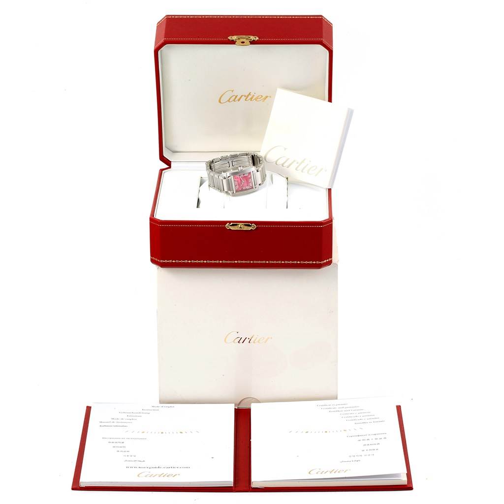 The Cartier Tank Francaise W51030Q3 Women's Stainless Steel White Dial W51030Q3 Women's Stainless Steel White Dial watch is shown in its open red box with manuals displayed around it.