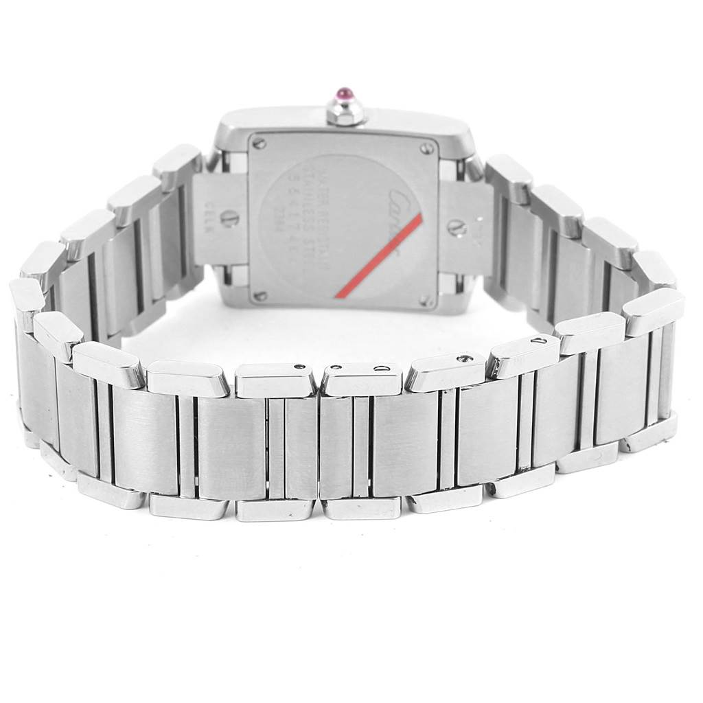 The image shows the back case and bracelet of a Cartier Tank Française watch, viewed from the rear.