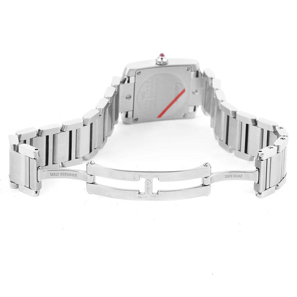 This image shows the back view of a Tank Francaise watch by Cartier, focusing on the open metal bracelet and clasp.