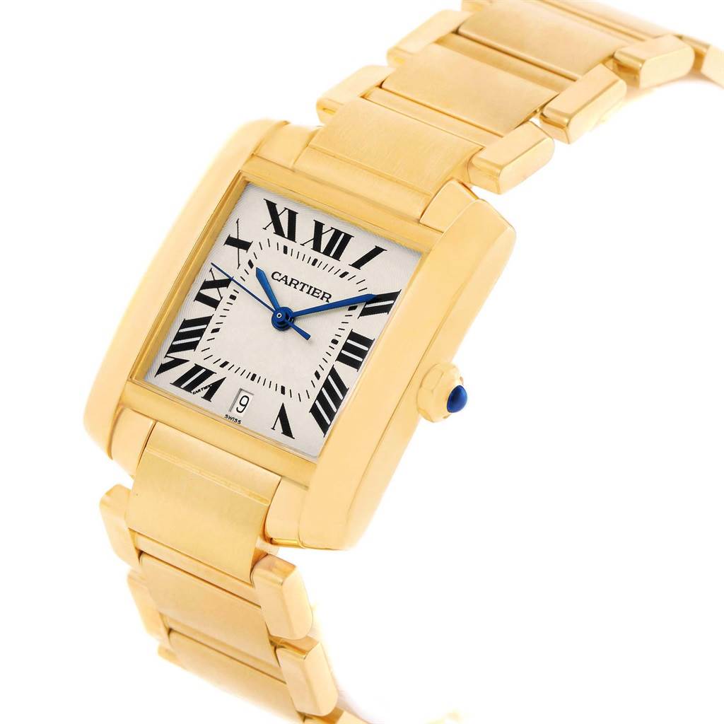 This image shows a Cartier Tank Francaise W50001R2 Men's Yellow Gold Silver Dial W50001R2 Men's Yellow Gold Silver Dial watch at a three-quarter angle, highlighting its face, bracelet, and crown.