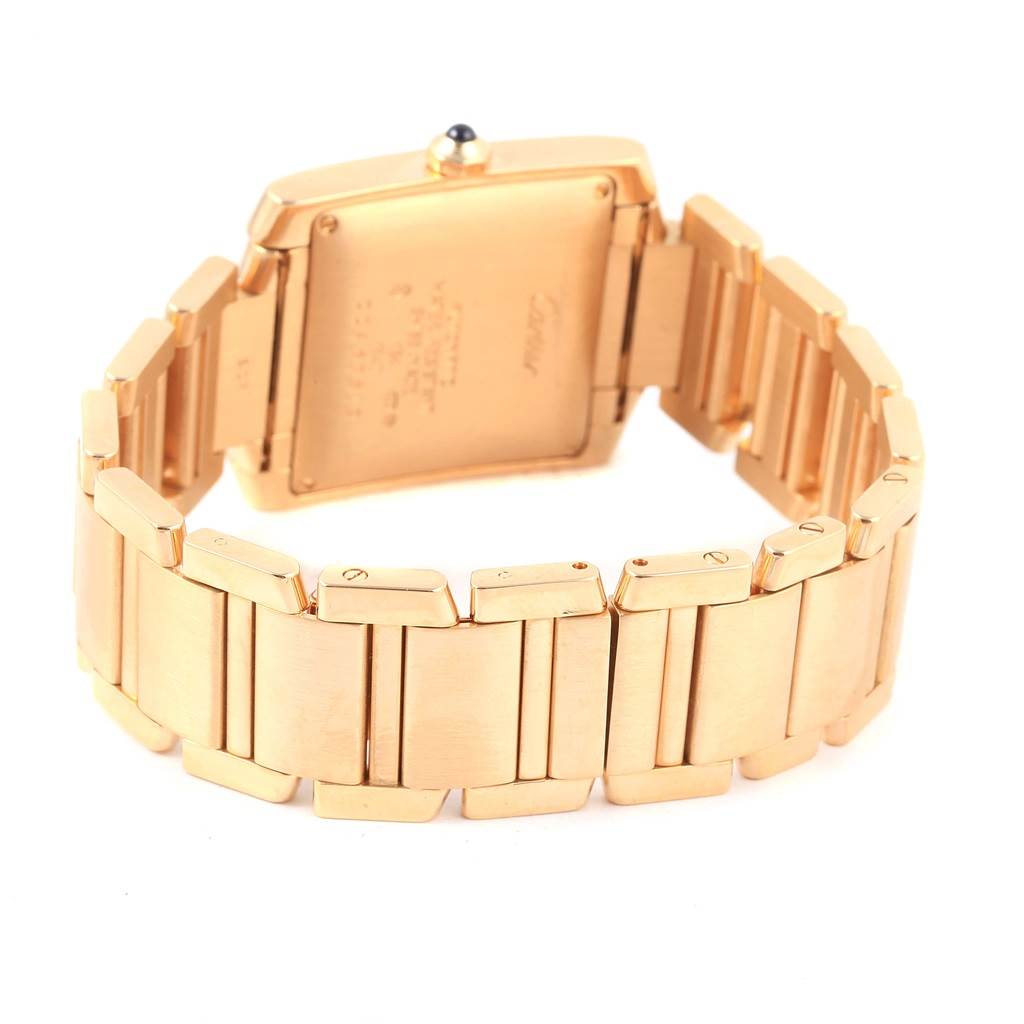 The image shows the back view of a Cartier Tank Francaise W50001R2 Men's Yellow Gold Silver Dial W50001R2 Men's Yellow Gold Silver Dial watch, highlighting the bracelet and the case back.