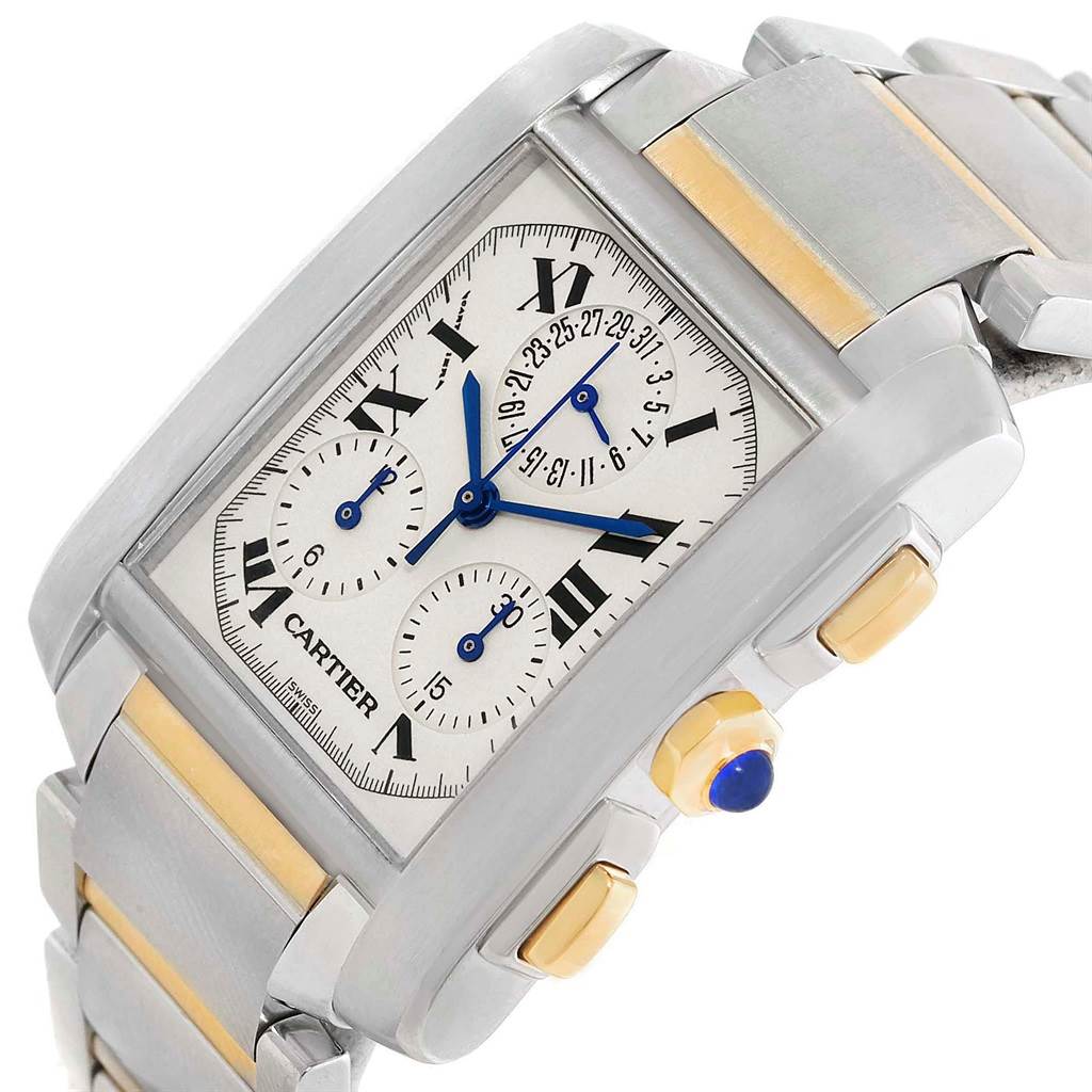 This image shows a Cartier Tank Francaise W51004Q4 Men's Steel and Gold (two tone) Silver Dial W51004Q4 Men's Steel and Gold (two tone) Silver Dial watch at an angled close-up, highlighting its dial, case, bracelet, and crown.