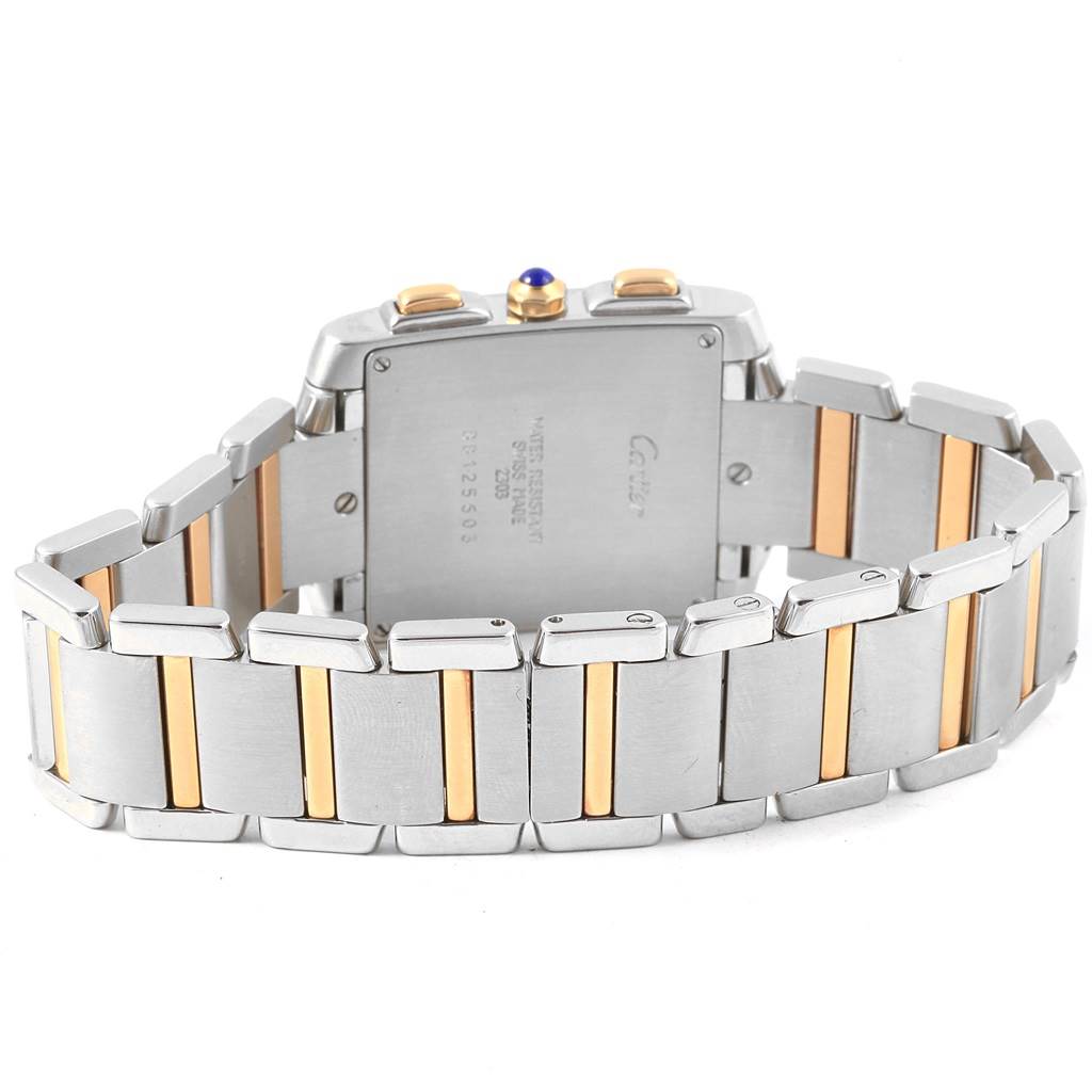 The image shows the back and bracelet of the Cartier Tank Française watch, highlighting its two-tone metal design.