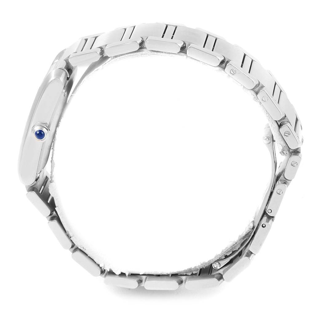 The image shows a side view of the Cartier Tank Francaise W51002Q3 Stainless Steel Silver Dial W51002Q3 Stainless Steel Silver Dial watch, highlighting its bracelet links and the crown with a blue cabochon.