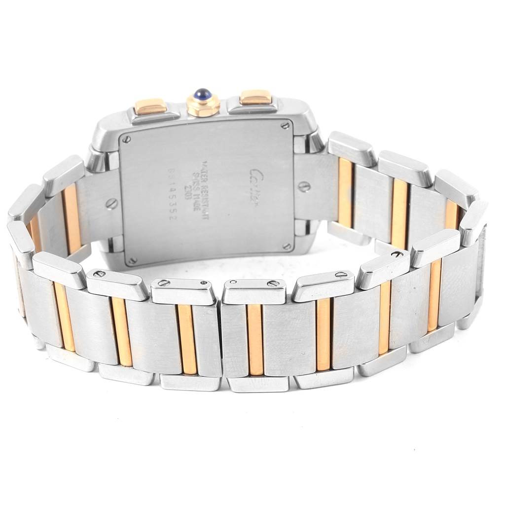 The image shows the back case and bracelet of a Cartier Tank Française watch, highlighting its two-tone metal design.