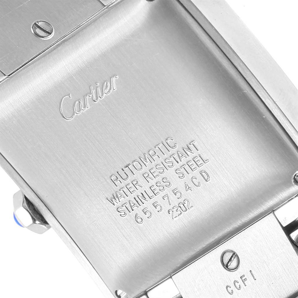 The image shows the back case of a Cartier Tank Francaise W51002Q3 Men
s Stainless Steel Silver Dial W51002Q3 Men
s Stainless Steel Silver Dial, displaying its engravings and metal bracelet attachment.