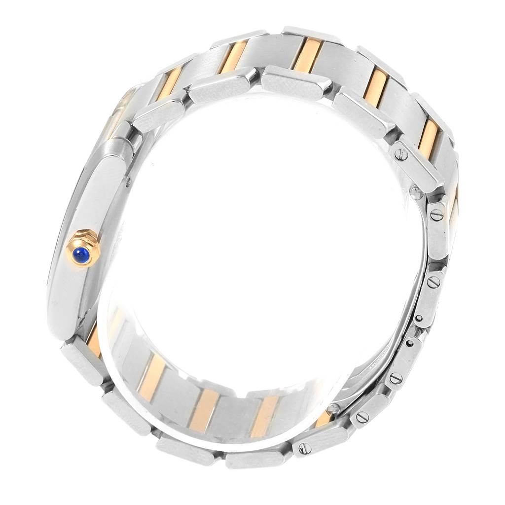 This image shows a side and partial top view of the Cartier Tank Française watch, highlighting its bracelet and crown with blue cabochon.