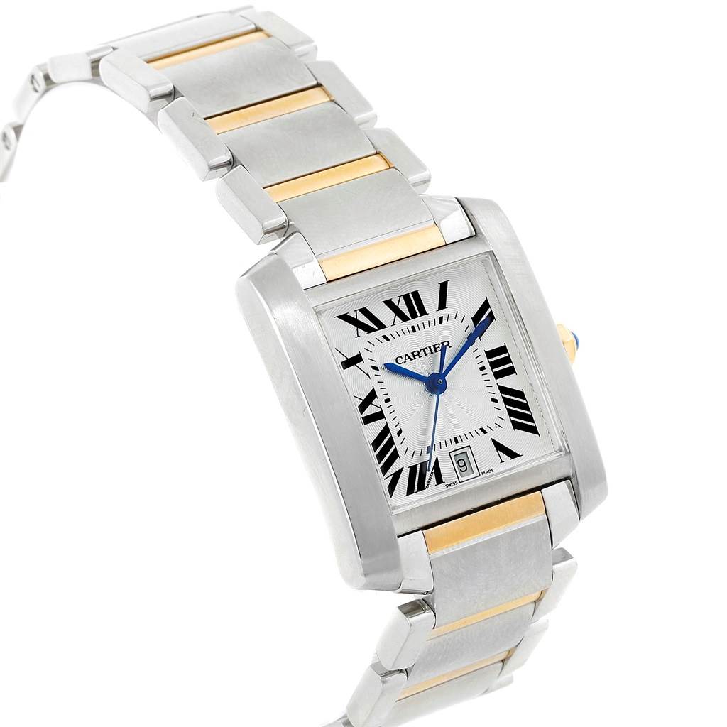 The Cartier Tank Francaise W51005Q4 Men
s Steel and Gold (two tone) Silver Dial W51005Q4 Men
s Steel and Gold (two tone) Silver Dial watch is shown at a slight angle, highlighting its rectangular face, roman numerals, and two-tone metal bracelet.