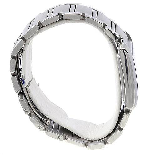 The image shows a side view of a Cartier Tank Francaise W51002Q3 Stainless Steel Silver Dial W51002Q3 Stainless Steel Silver Dial watch, highlighting its silver metal bracelet links and case.