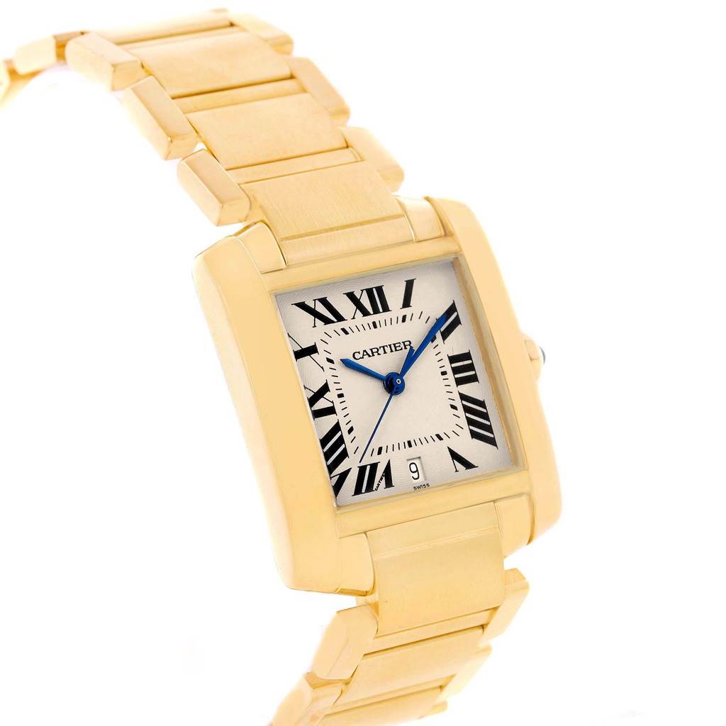 The image showcases a Cartier Tank Francaise W50001R2 Yellow Gold Silver Dial W50001R2 Yellow Gold Silver Dial watch angled to display the face, bezel, crown, and part of the bracelet.