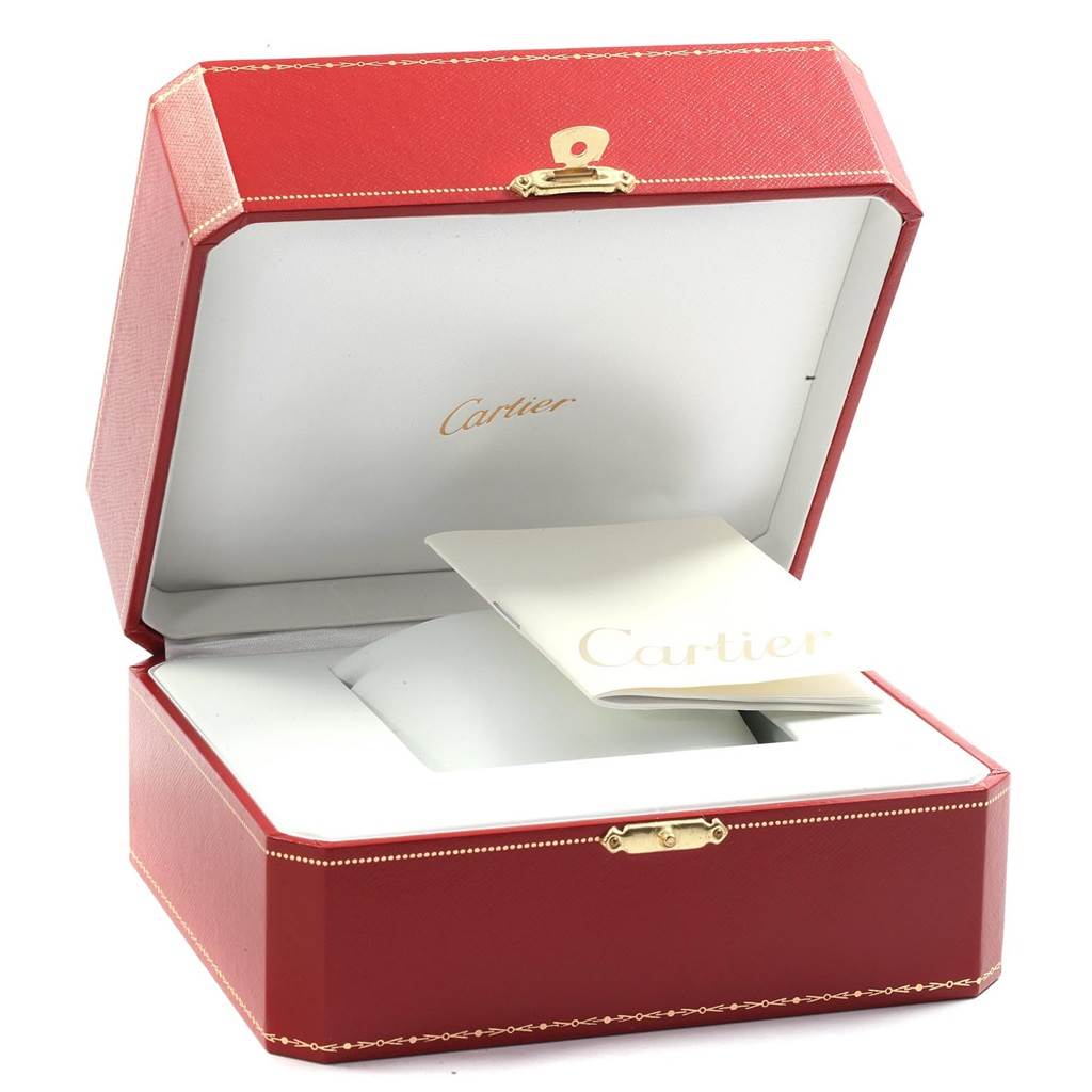 The image shows an open Cartier watch box for the Tank Francaise model, featuring a red exterior and white interior, along with a booklet.