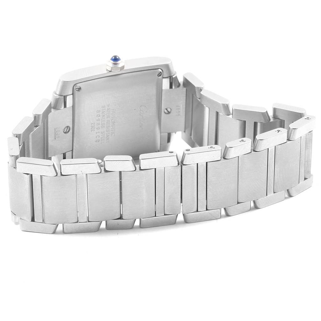 This image shows the back and bracelet of a Cartier Tank Française watch, emphasizing the clasp and serial number.