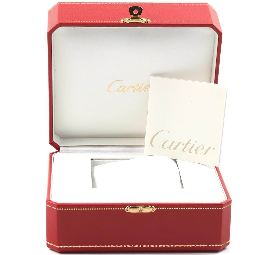 The image shows an open red box for a Cartier Tank Francaise W51024Q3 Men's Stainless Steel Silver Dial W51024Q3 Men's Stainless Steel Silver Dial watch with a Cartier booklet inside.