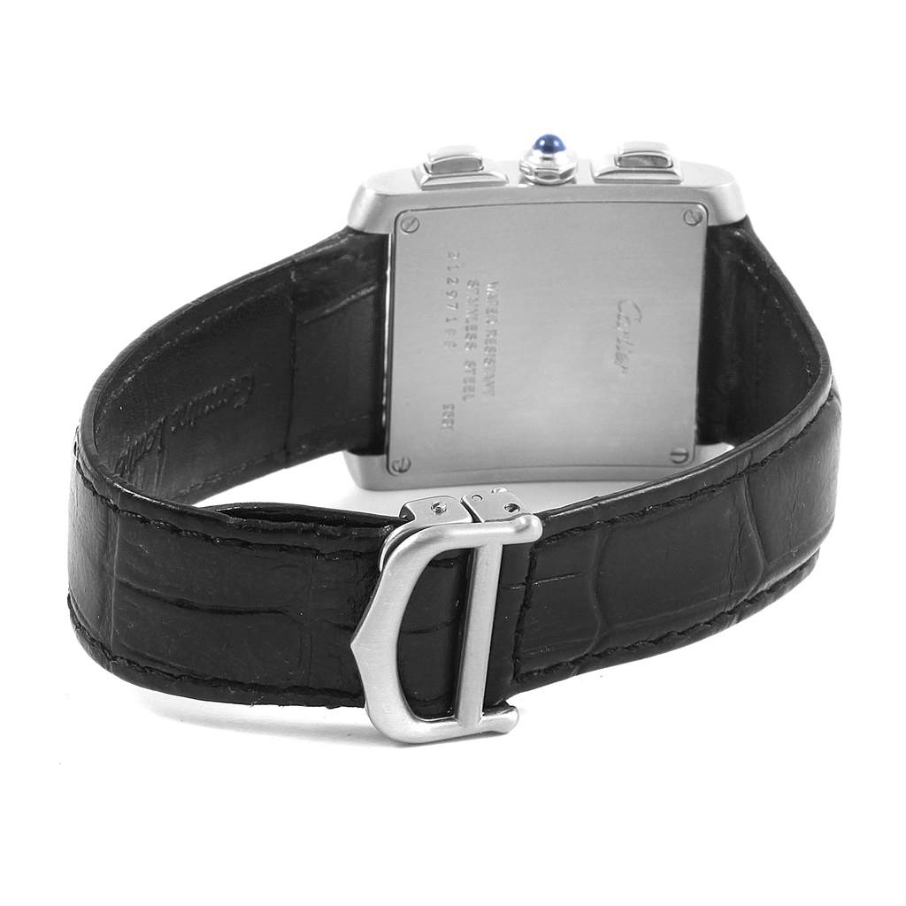 The image shows the back side of a Cartier Tank Française watch, displaying its caseback and leather strap with a buckle.