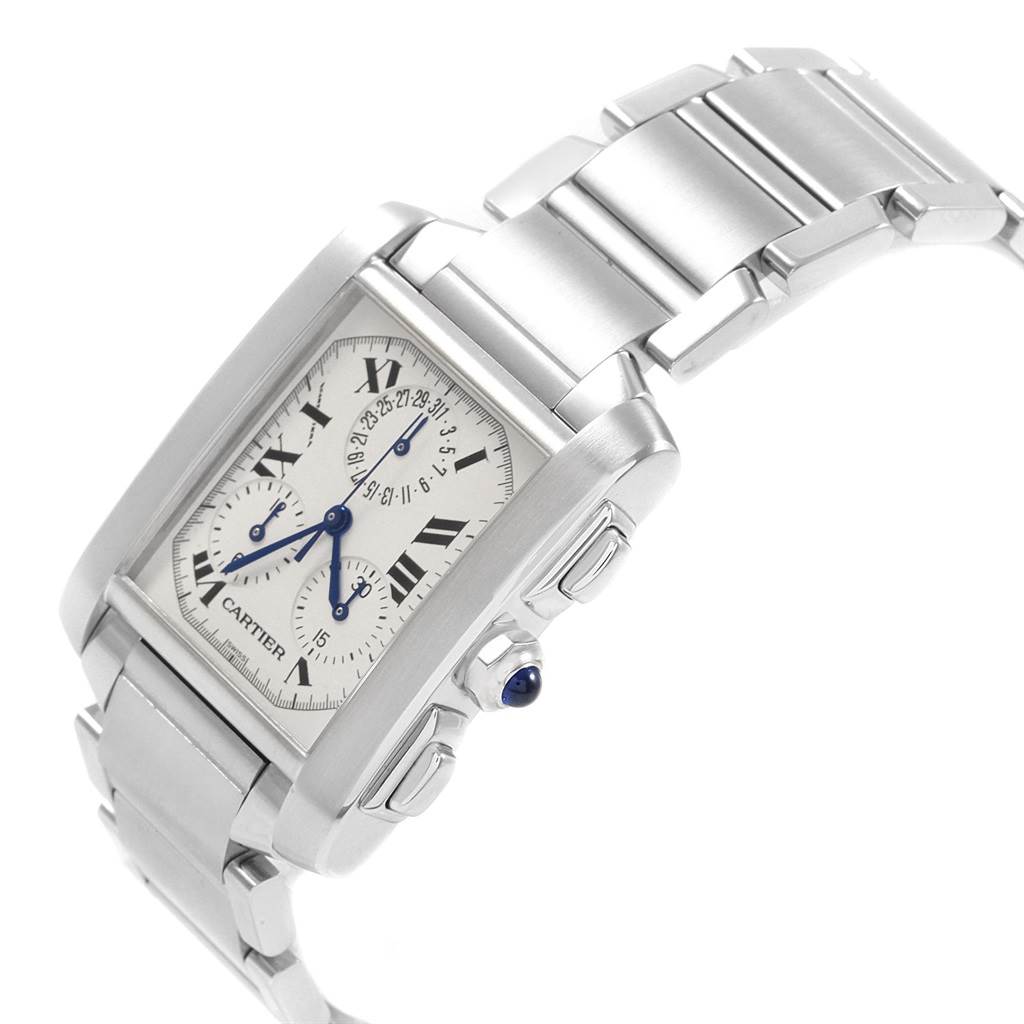The image shows a Cartier Tank Francaise W51001Q3 Men
s Stainless Steel White Dial W51001Q3 Men
s Stainless Steel White Dial watch at an angle highlighting its rectangular face, bracelet, and crown with blue cabochon.