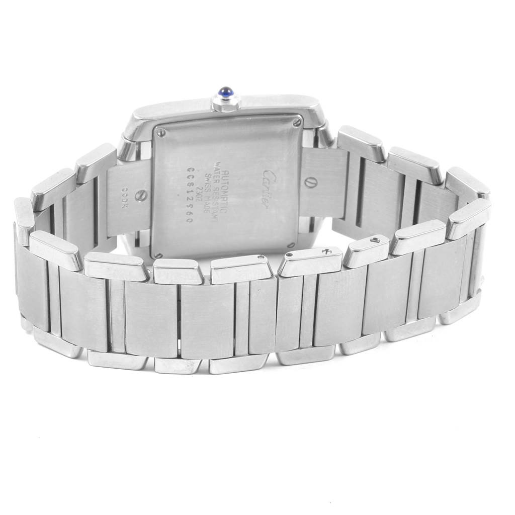 The image shows a rear view of the Cartier Tank Francaise W51002Q3 Stainless Steel Silver Dial W51002Q3 Stainless Steel Silver Dial watch, highlighting the back case and metal bracelet.