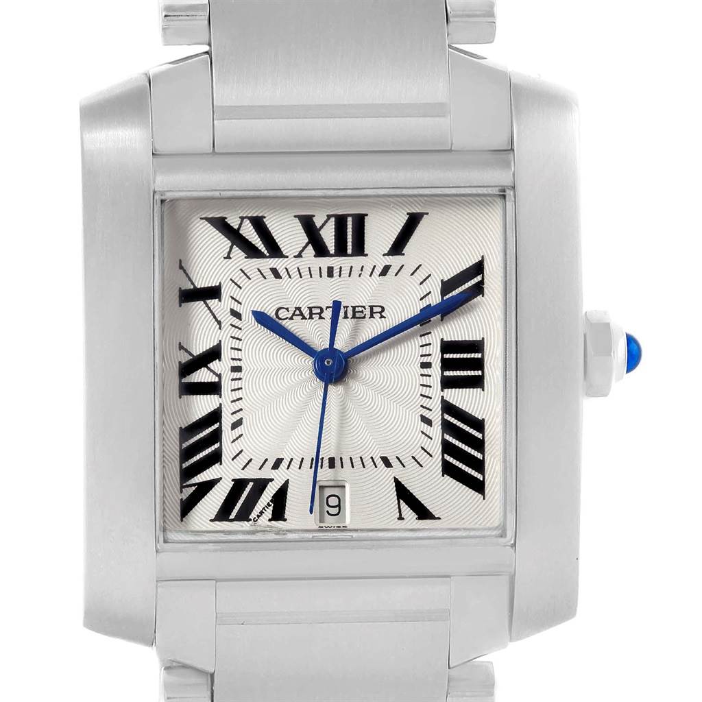 This image shows a close-up of a Cartier Tank Francaise W51002Q3 Stainless Steel Silver Dial W51002Q3 Stainless Steel Silver Dial watch, highlighting its face, Roman numerals, and blue hands.