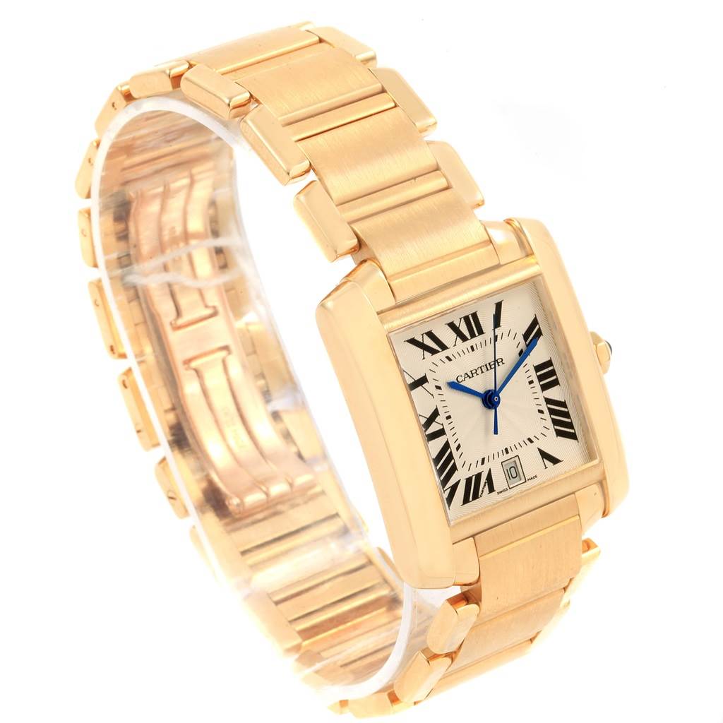 This image shows a side and front view of a Cartier Tank Francaise W50001R2 Yellow Gold Silver Dial W50001R2 Yellow Gold Silver Dial watch with a gold bracelet and Roman numeral dial.