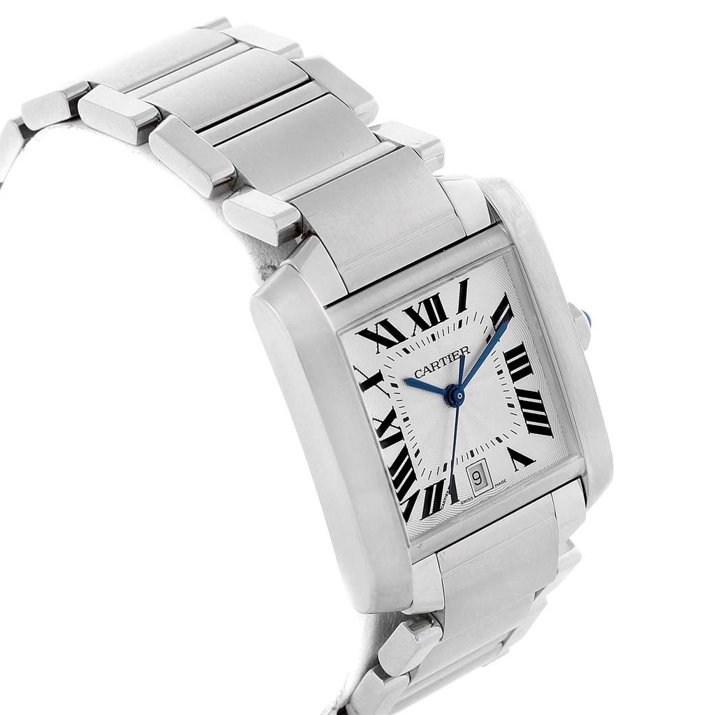 The image shows a Cartier Tank Française watch at an angled view, highlighting its bracelet, square case, and face with Roman numerals.