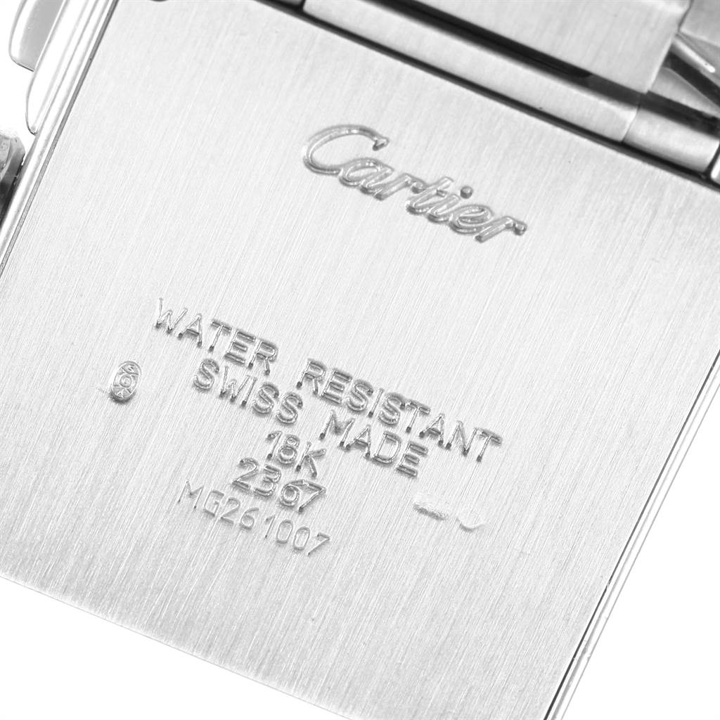The image shows the engraved back plate and clasp of a Cartier Tank Francaise 2367 Men's White Gold Silver Dial 2367 Men's White Gold Silver Dial watch at a close-up angle.