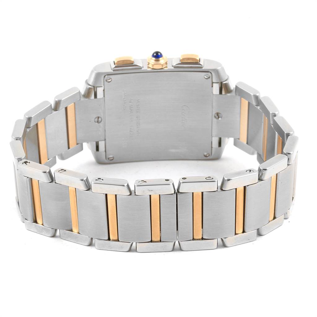 This image shows the back view of a Tank Francaise model by Cartier, highlighting its two-tone metal bracelet and clasp.