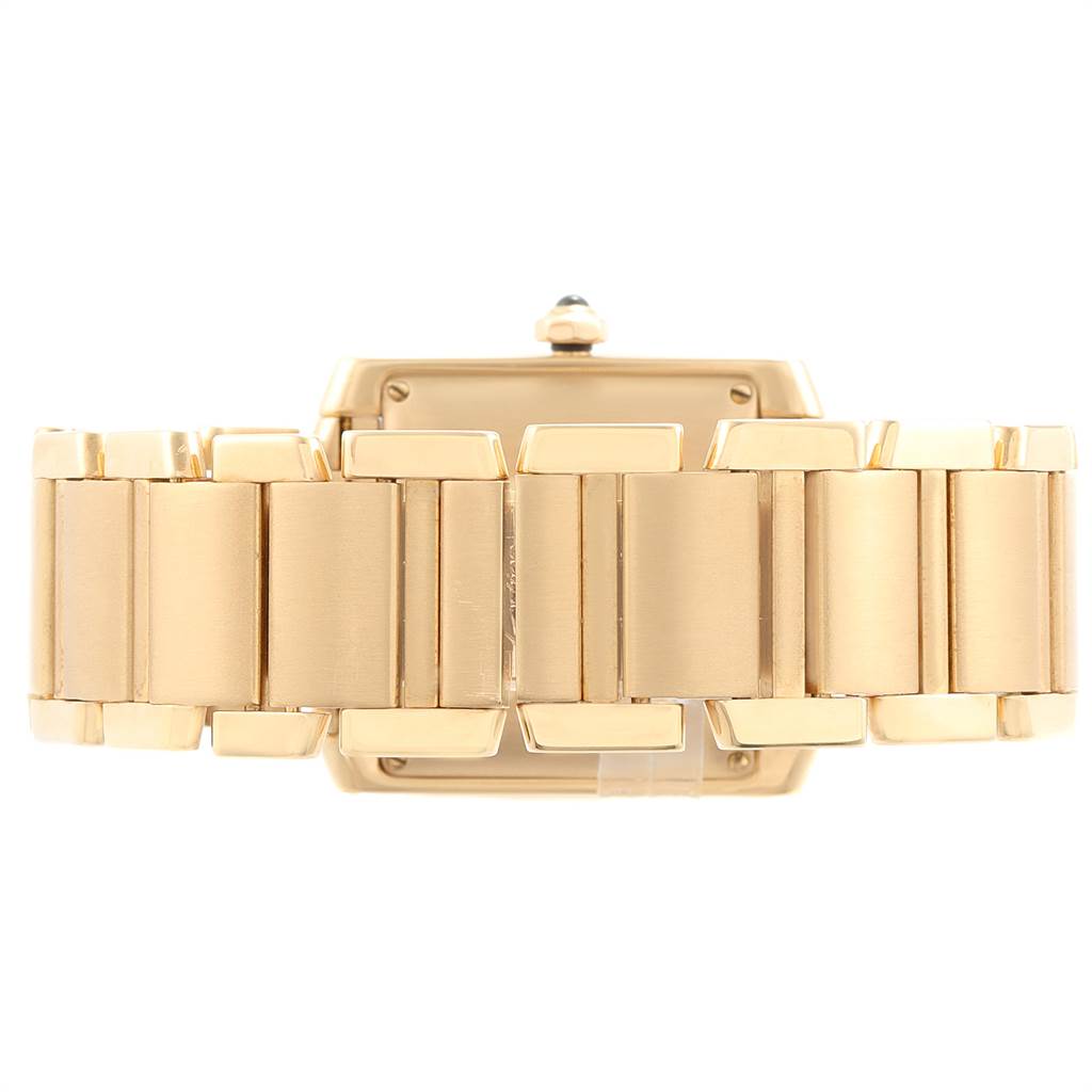This image shows a rear view of the gold bracelet and part of the clasp of the Cartier Tank Francaise W50001R2 Yellow Gold Silver Dial W50001R2 Yellow Gold Silver Dial watch.