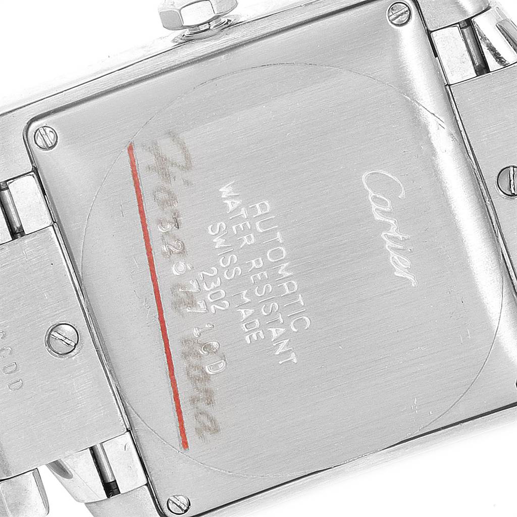 The image shows the back case of a Cartier Tank Francaise W51002Q3 Men's Stainless Steel Silver Dial W51002Q3 Men's Stainless Steel Silver Dial watch, focusing on its engravings and metal links.