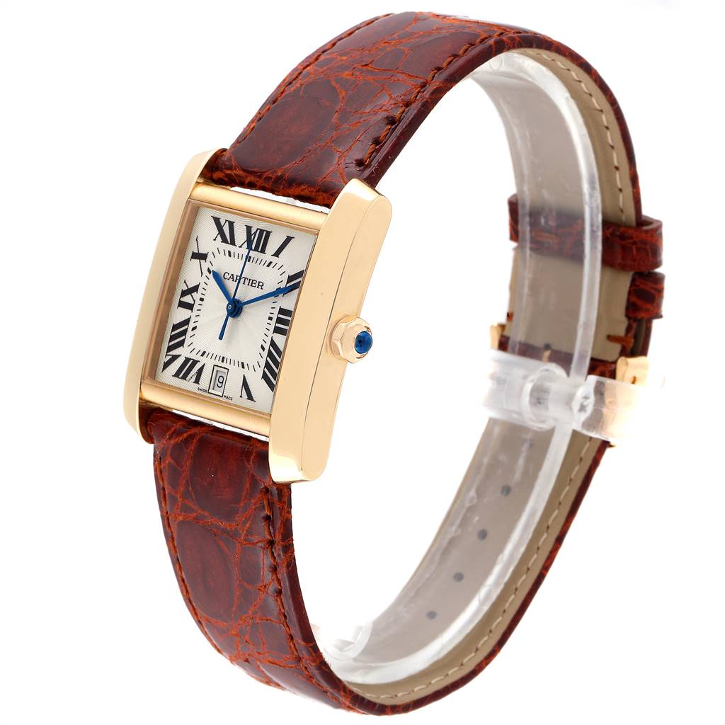 This Cartier Tank Francaise W5000156 Yellow Gold Silver Dial W5000156 Yellow Gold Silver Dial watch is shown at a three-quarter angle, displaying its face, strap, and crown.