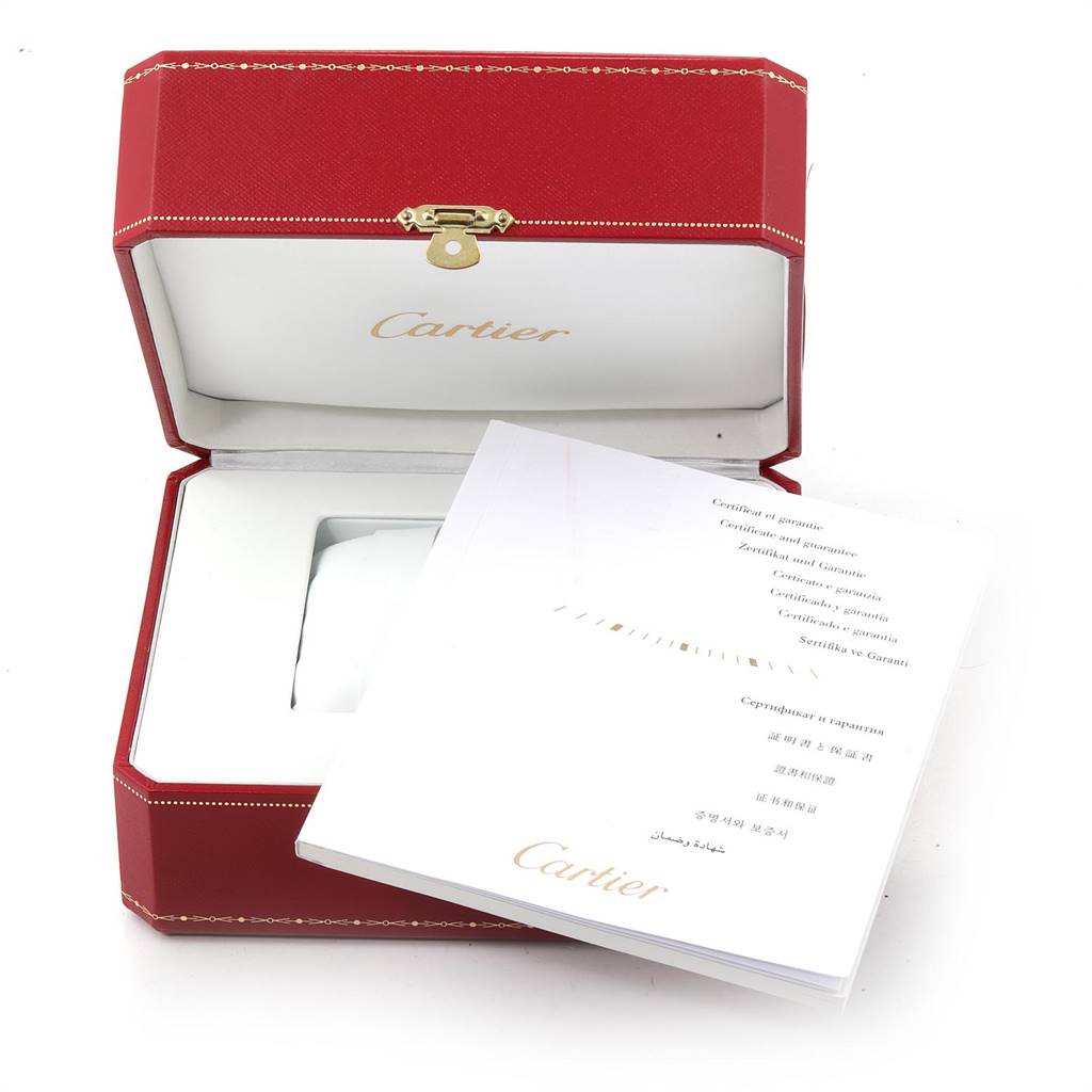 This image shows the open red box and guarantee booklet for a Cartier Tank Francaise W51005Q4 Men's Steel and Gold (two tone) Silver Dial W51005Q4 Men's Steel and Gold (two tone) Silver Dial watch.