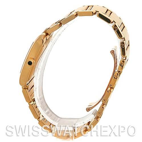 The image shows the side view of a Cartier Tank Francaise W50001R2 Stainless Steel Silver Dial W50001R2 Stainless Steel Silver Dial watch, highlighting its gold bracelet and clasp mechanism.