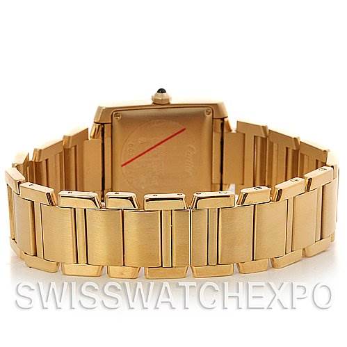 This image shows the back and bracelet of the Cartier Tank Francaise W50001R2 Stainless Steel Silver Dial W50001R2 Stainless Steel Silver Dial watch, displaying its gold finish and the clasp mechanism.