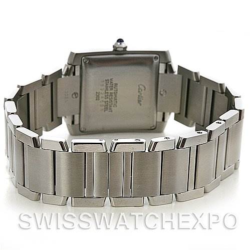 This image shows the back view of a Cartier Tank Française watch, focusing on the case back and metal bracelet.