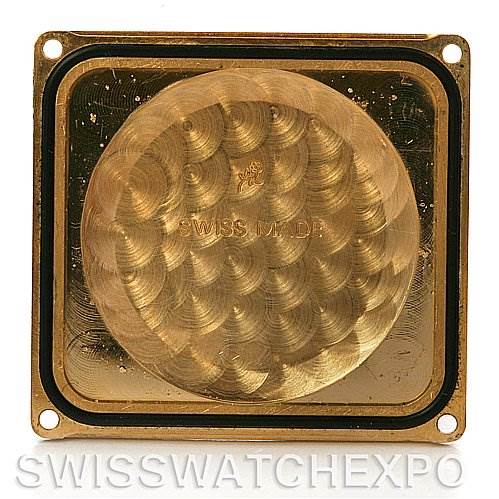 This image shows the inside case back of a Cartier Tank Francaise W5000156 Yellow Gold Silver Dial W5000156 Yellow Gold Silver Dial watch, displaying its golden interior and "Swiss Made" inscription.