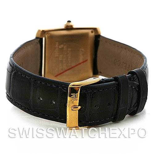 The image shows the rear view of the Cartier Tank Française watch, including the back case and black leather strap with a gold buckle.