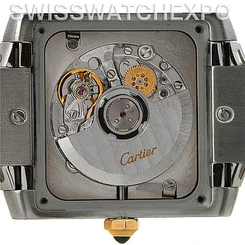 This image shows the back view of a Cartier Tank Française watch, revealing its internal mechanical parts and movements.