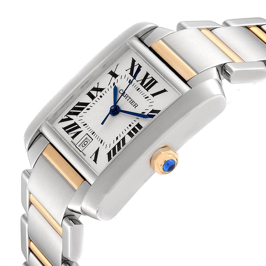 This image shows a Cartier Tank Francaise W51005Q4 Men's Steel and Gold (two tone) Silver Dial W51005Q4 Men's Steel and Gold (two tone) Silver Dial watch viewed from a slight angle, highlighting the face, crown, and part of the bracelet.