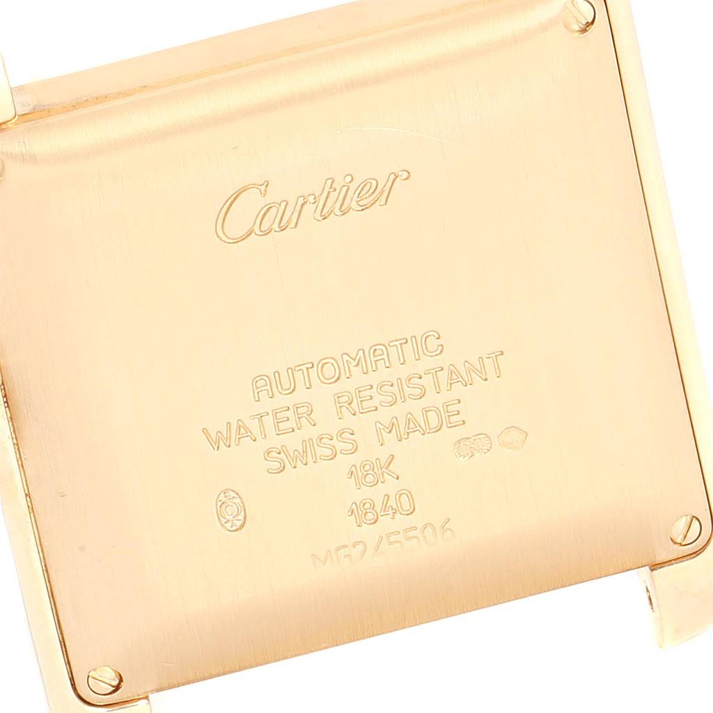 This image shows the case back of a Cartier Tank Française watch, displaying text about its features.