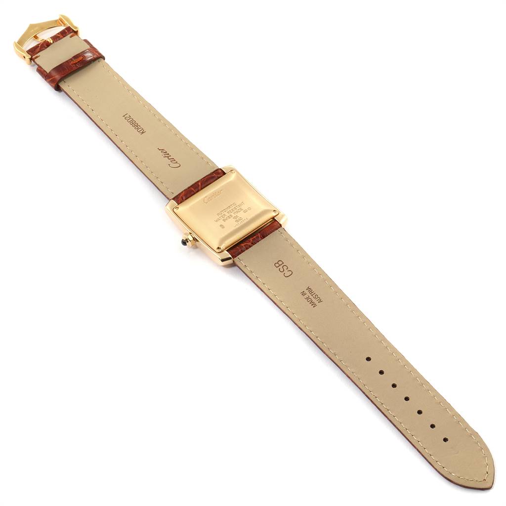 This image shows the back view of a Cartier Tank Francaise W5000156 Men's Yellow Gold Silver Dial W5000156 Men's Yellow Gold Silver Dial watch, highlighting its leather strap and case back.