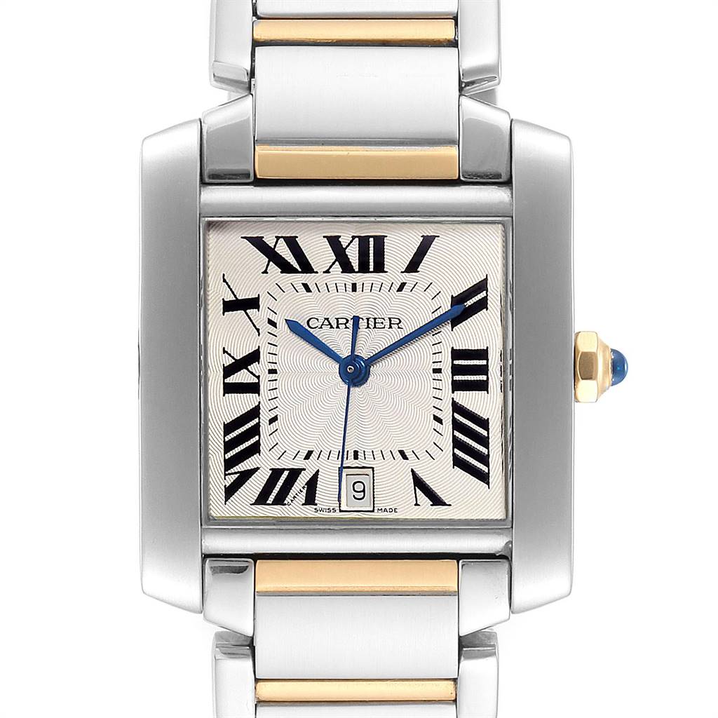 The image shows a front view of a Cartier Tank Francaise W51005Q4 Men's Steel and Gold (two tone) Silver Dial W51005Q4 Men's Steel and Gold (two tone) Silver Dial watch, highlighting the face, bracelet, date window, and blue cabochon crown.