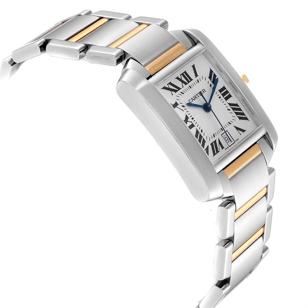 The Tank Française by Cartier is shown at a slight angle, highlighting its rectangular face, stainless steel and gold bracelet.