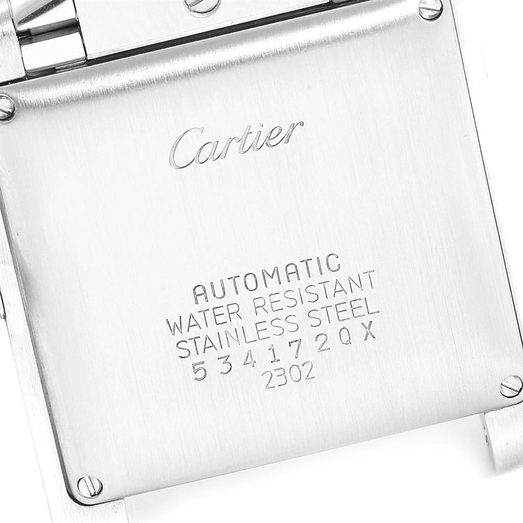 This image shows the back case of a Cartier Tank Française watch, highlighting the brand logo and specifications.