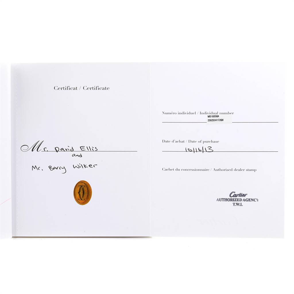 This image shows an opened certificate booklet for a Cartier Tank Francaise W51005Q4 Men's Steel and Gold (two tone) Silver Dial W51005Q4 Men's Steel and Gold (two tone) Silver Dial watch.