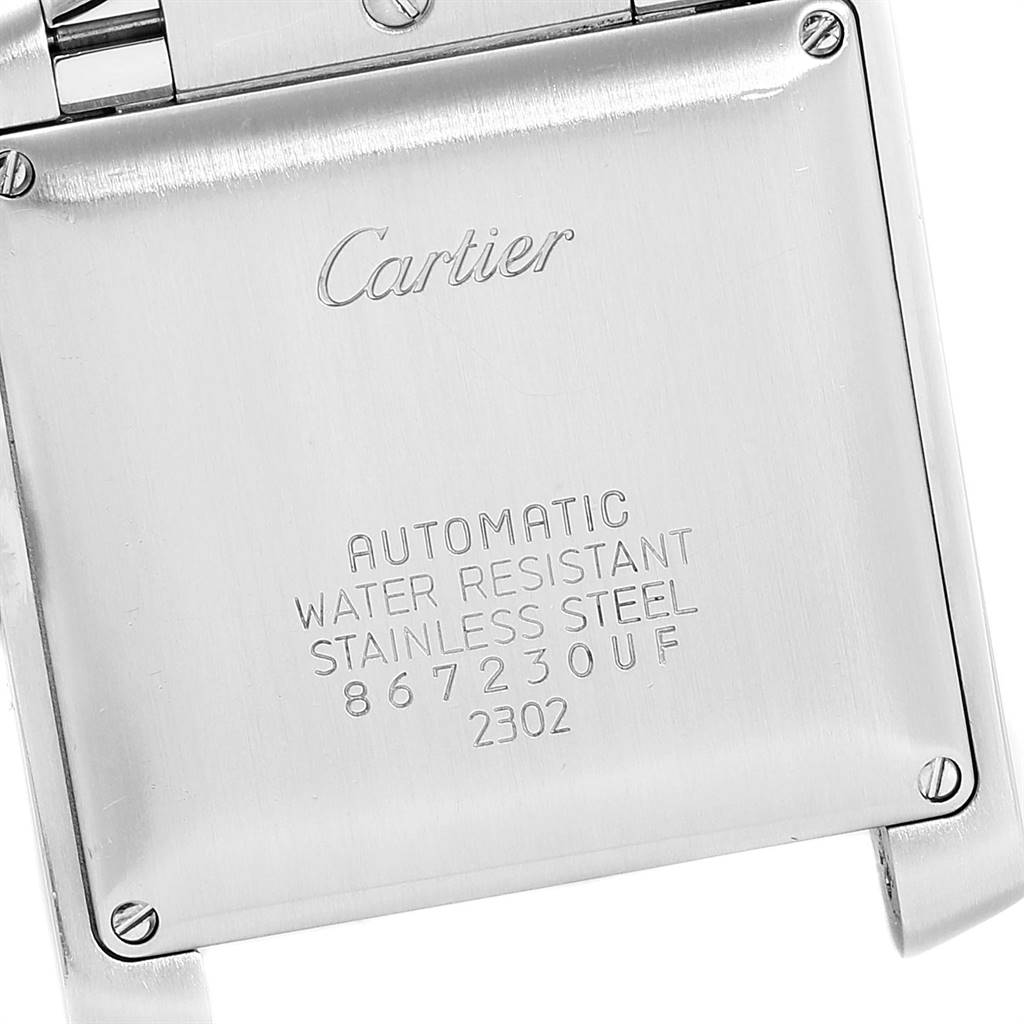 The image shows the case back of a Cartier Tank Francaise W51005Q4 Men's Steel and Gold (two tone) Silver Dial W51005Q4 Men's Steel and Gold (two tone) Silver Dial watch, featuring engraved branding and specifications.