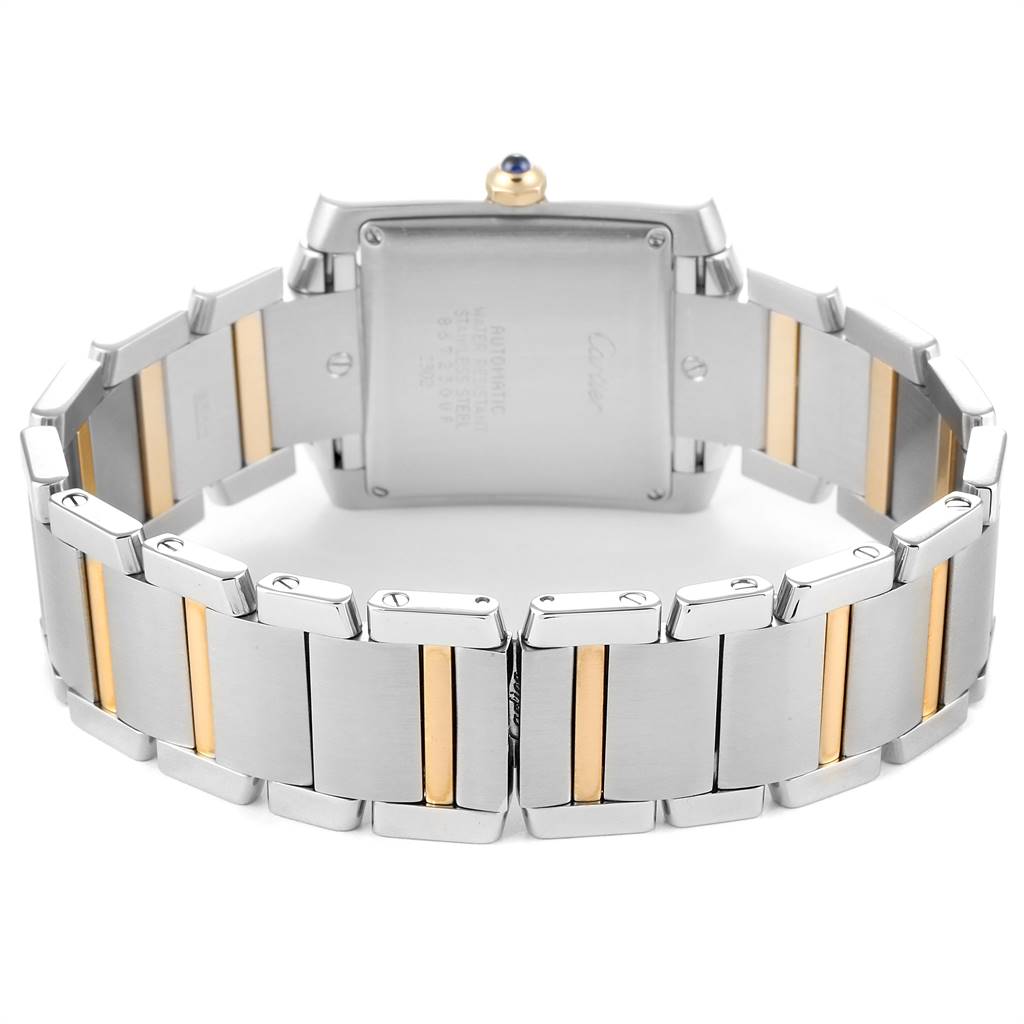 The image shows the back case and bracelet of a Cartier Tank Francaise W51005Q4 Men's Steel and Gold (two tone) Silver Dial W51005Q4 Men's Steel and Gold (two tone) Silver Dial watch, highlighting its two-tone metal design.