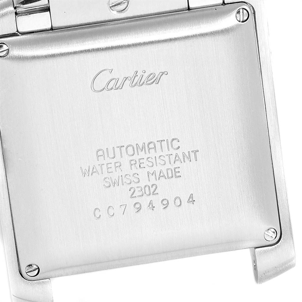 The image shows the back case of a Cartier Tank Francaise W51005Q4 Men's Steel and Gold (two tone) Silver Dial W51005Q4 Men's Steel and Gold (two tone) Silver Dial watch, with details about the watch's features and model information.